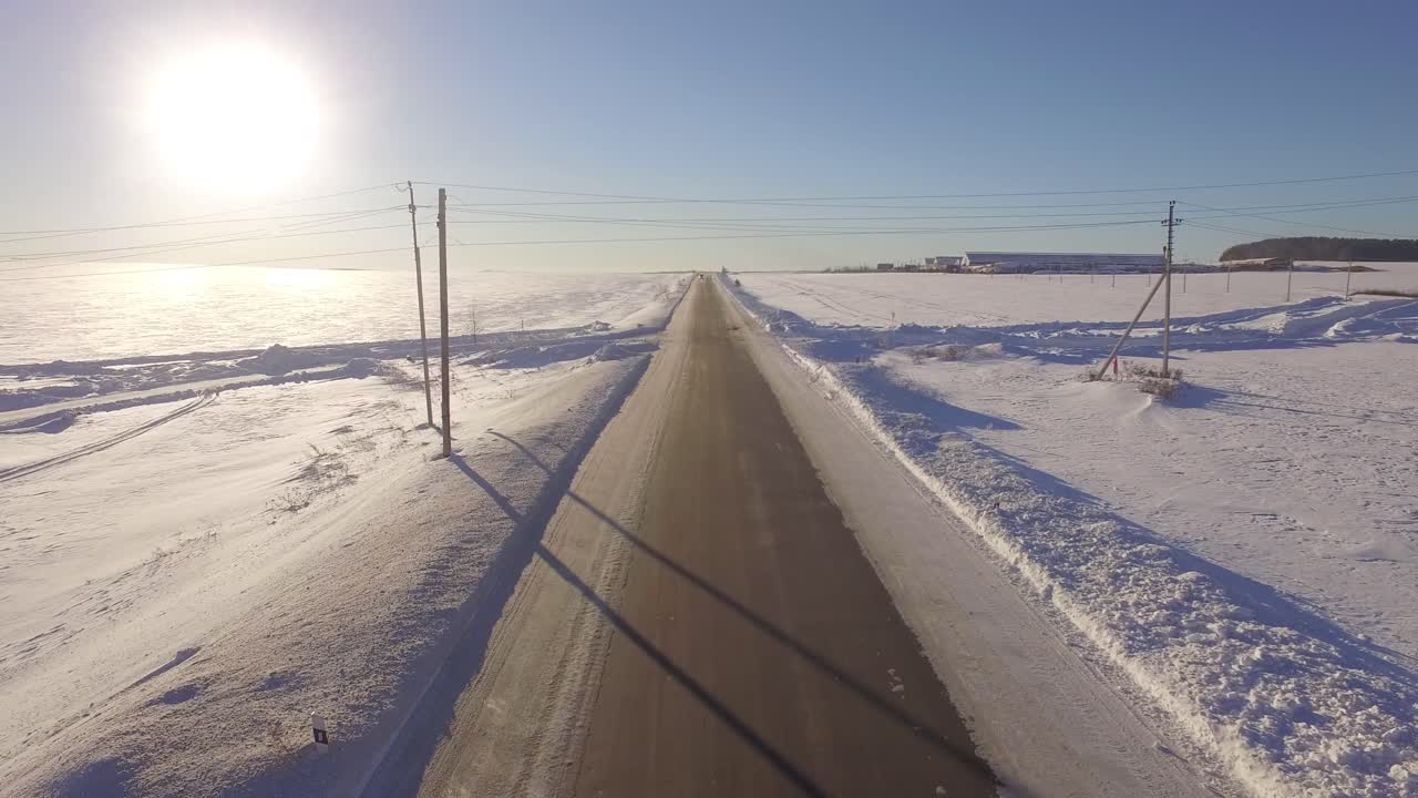 Snowy Country Road with Vehicle