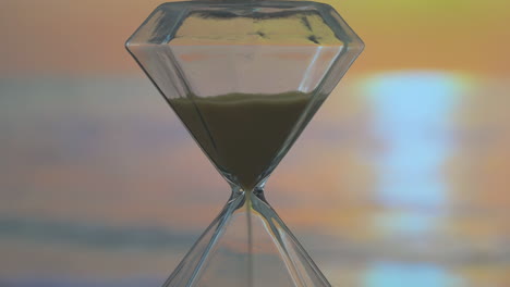 Fantasy-background-hourglass-with-sand-running-through-it,-measuring-the-passage-of-time-as-gravity-pulls-the-granules-from-one-chamber-to-another