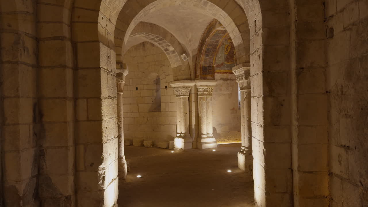 Ancient crypt with Romanesque arches, medieval frescoes, and dim atmospheric lighting