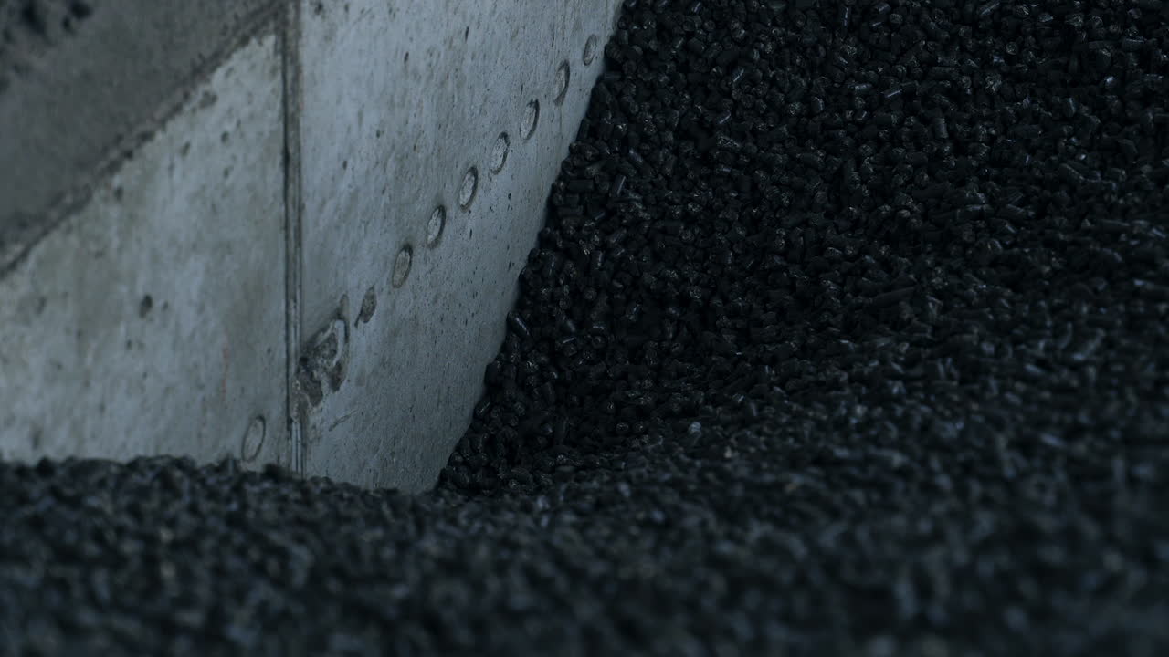 Full storage of coal in elevator storage. Dark elevator heating chemical coal.