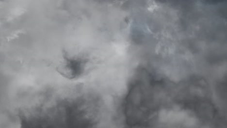 Striking lightning ,gray clouds in the sky