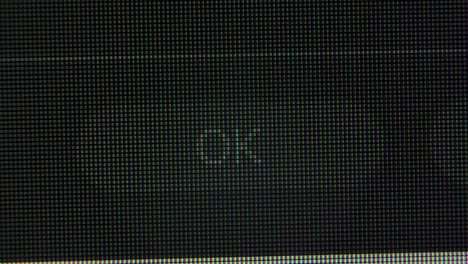 the cursor arrow moves across the screen and clicks on the ok button. screen monitor pixels close up. red, blue and green subpixels create the image on the screen