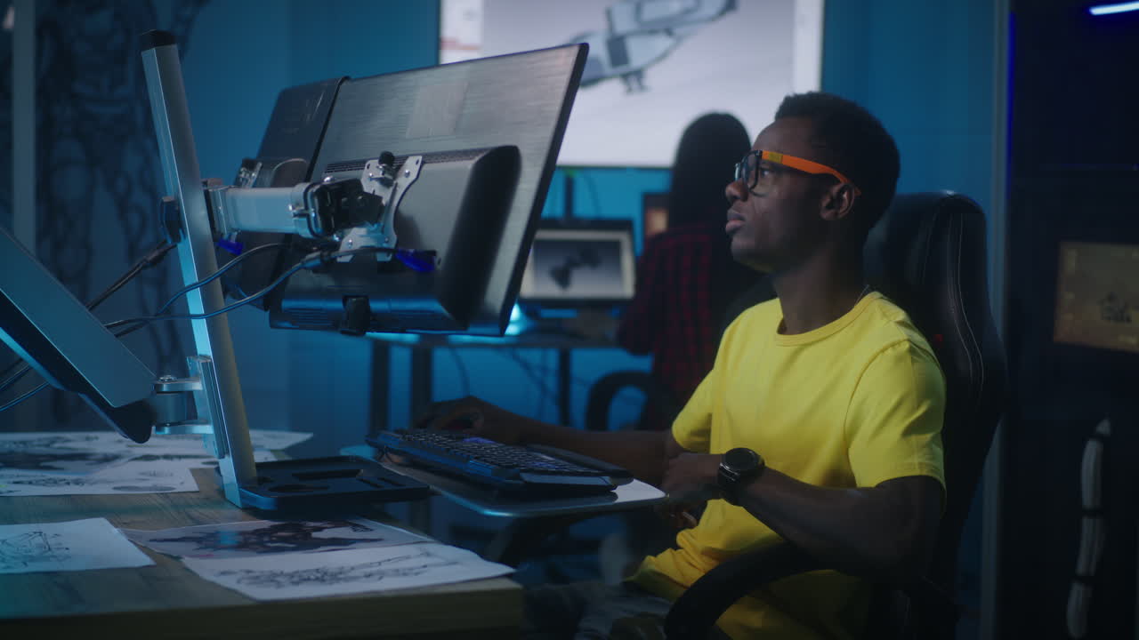 Young designers working late night in a studio