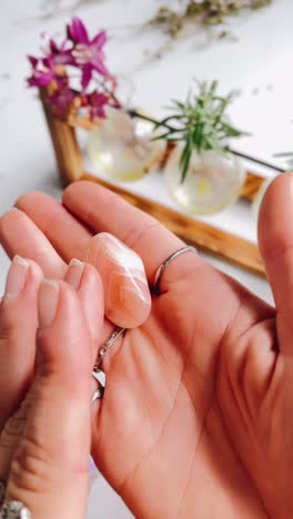 applying natural cream or stone to hands