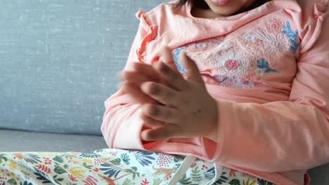 child playing with finger paint