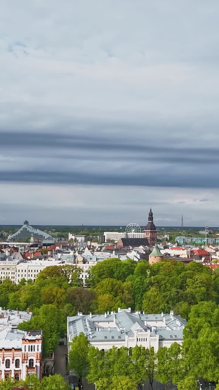 Time-lapse showing lush green nature alongside stunning architecture in Riga, Latvia.