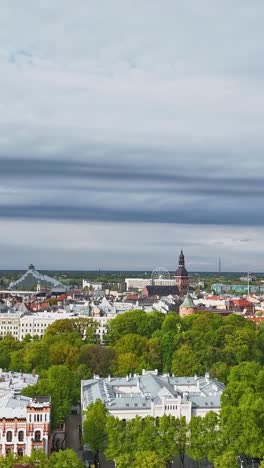 time-lapse showing lush green nature alongside stunning architecture in riga, latvia.