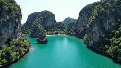aerial view of tropical island bay with limestone cliffs