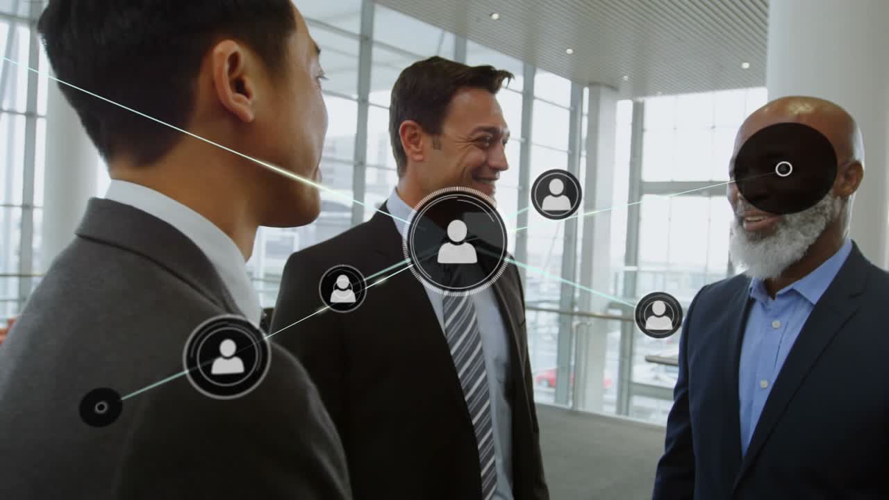 Animation of connected icons over multiracial entrepreneurs sharing thoughts in office