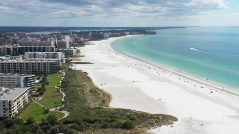 aerial view of wide siesta key beach and beachfront apartments