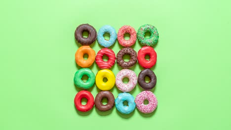 Chocolate-donuts-top-view-stop-motion.-Eating-glazed-doughnuts