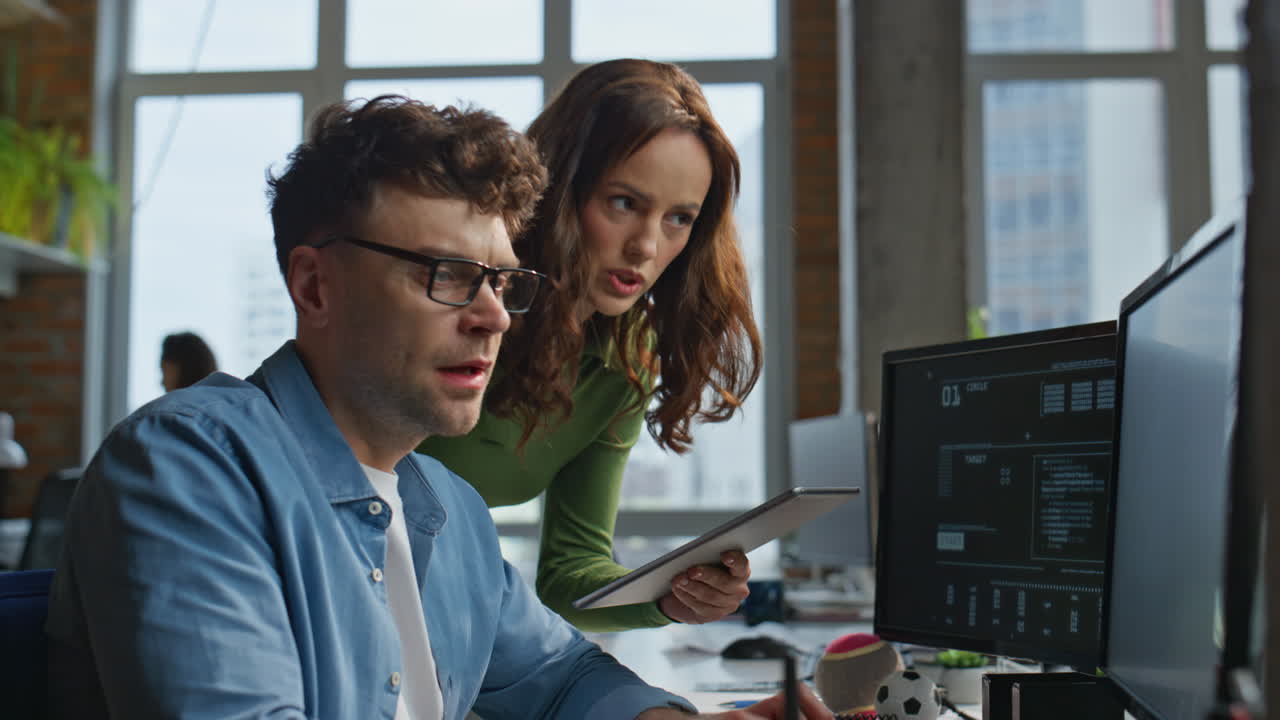 Couple colleagues discussing strategy planning expansion at panoramic window