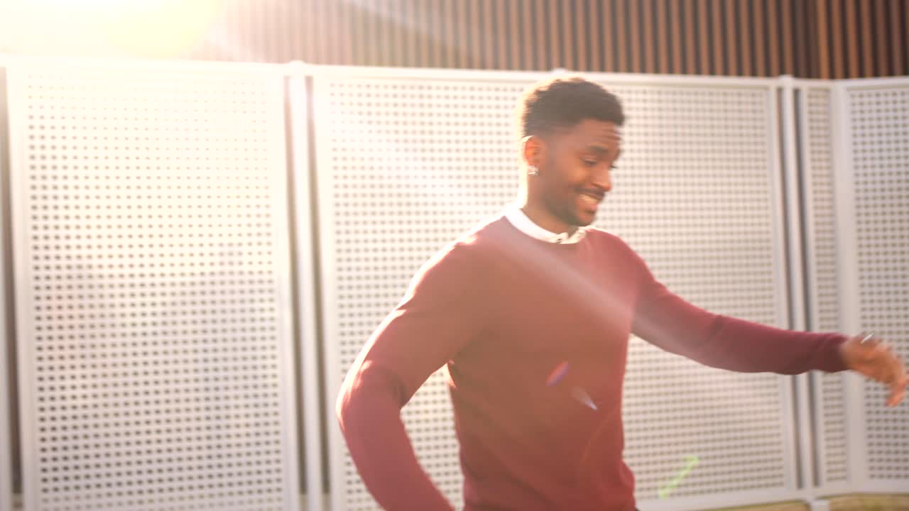 Man in a sweater outdoors