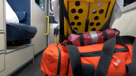 Stretcher-removed-form-back-of-ambulance-viewed-from-near-airway-seat