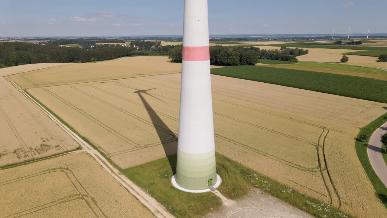 Windmill drone flight up at corn field