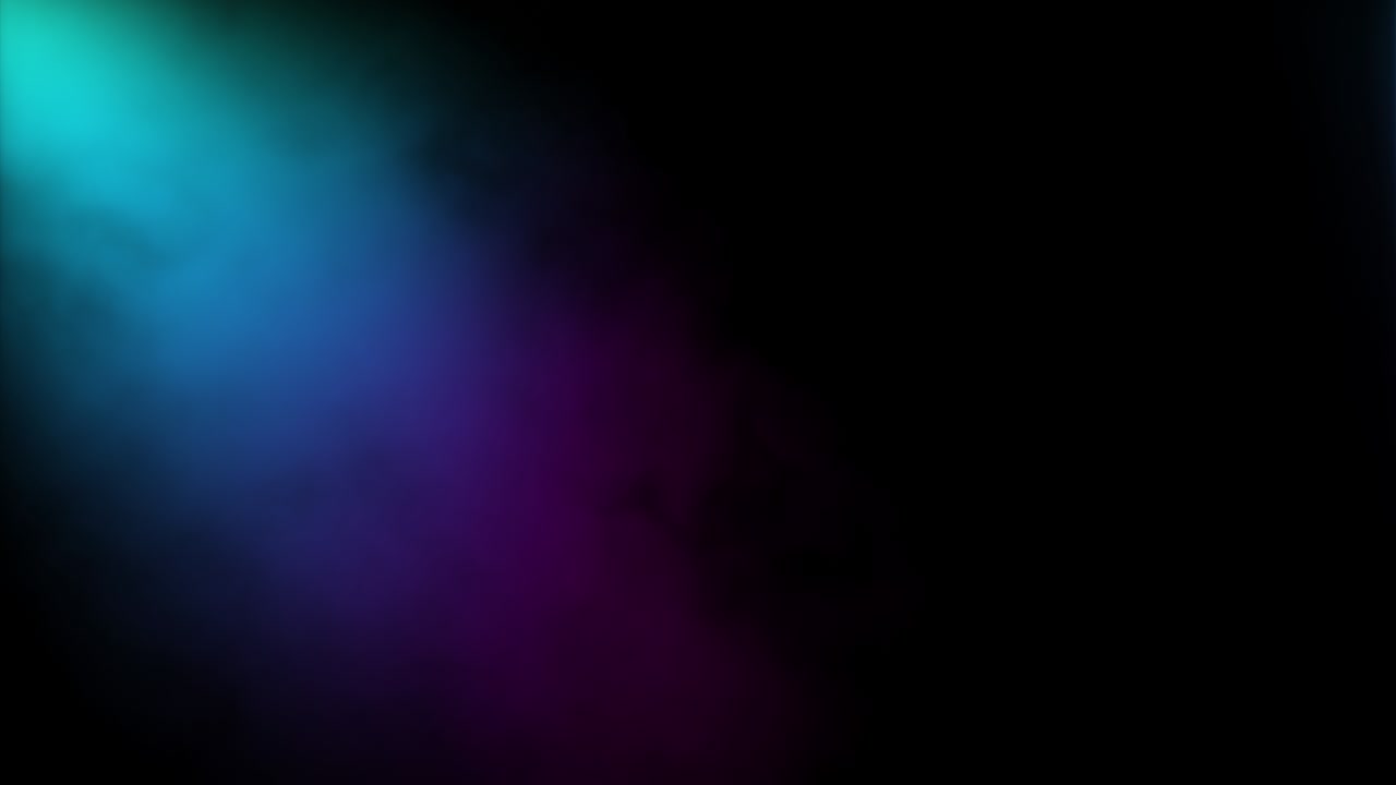 Colorful smoke on a black background loop stock video