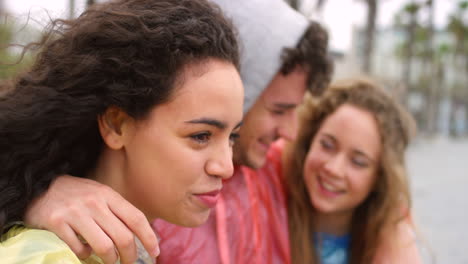 cheerful young friends talking