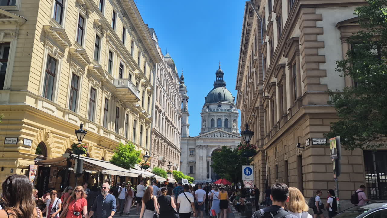 The crowded Zrínyi Street and the St. Stephen's basilica in Budapest, Hungary