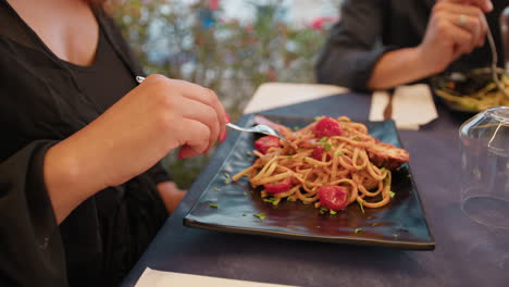 delicious plate of spaghetti gourmet dish with fish and tomatoes
