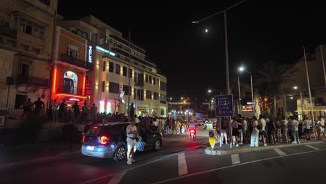 paceville nightlife scene with crowds and traffic