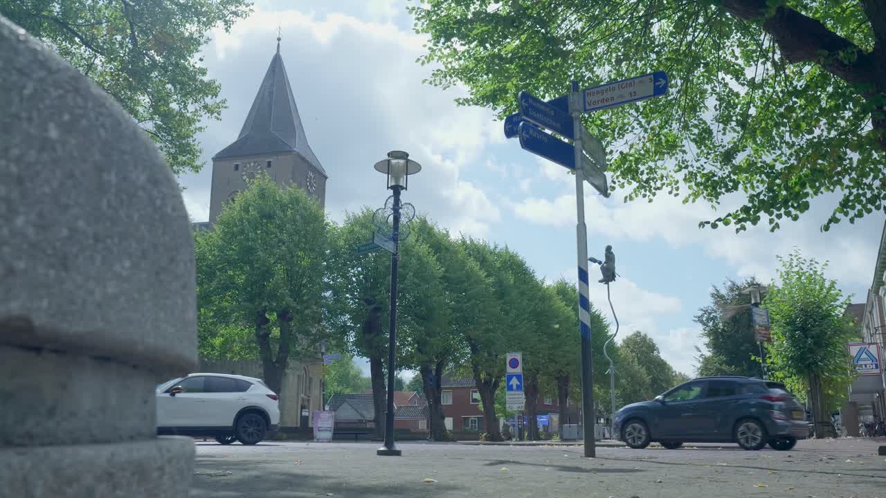 Town street with church and signs