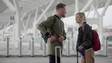 couple waiting at train station