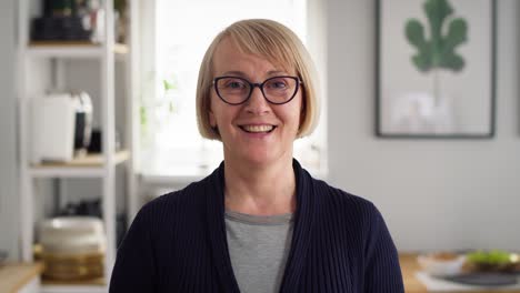 video portrait of happy senior woman at home