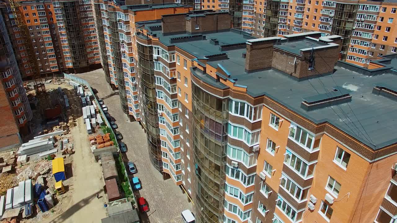 New residential complex in the downtown. Modern high-rise buildings of the cityscape. Luxury multi-storey buildings in new district.