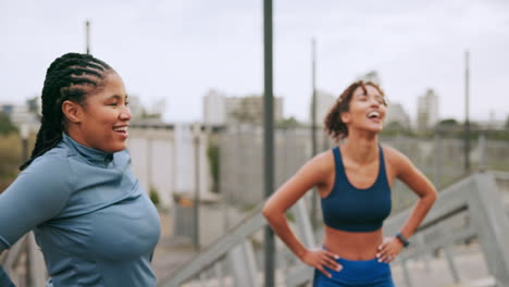 two women outdoors stretching