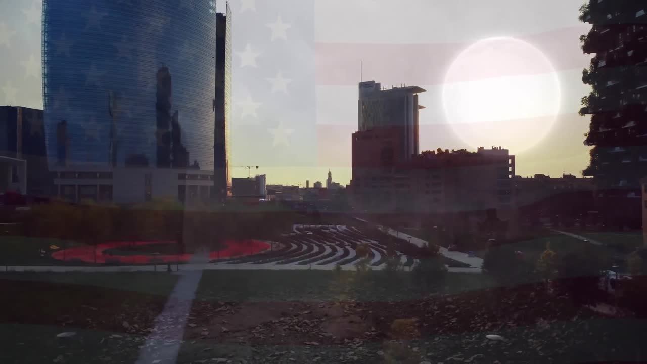 animación de la bandera de los estados unidos sobre el paisaje urbano