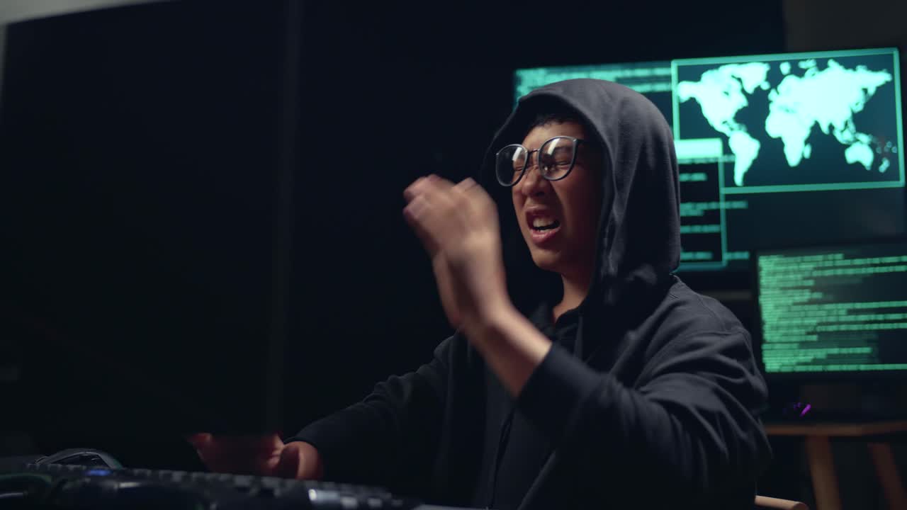 Asian Boy Hacker Using Computer Hacking And Disappointed