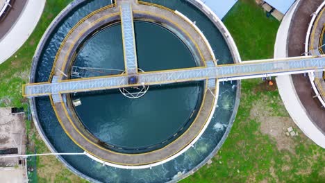 4k aerial drone top down view clarifier sedimentation tank. aerial view water treatment plant. top view of recirculation solid contact clarifier sedimentation tank