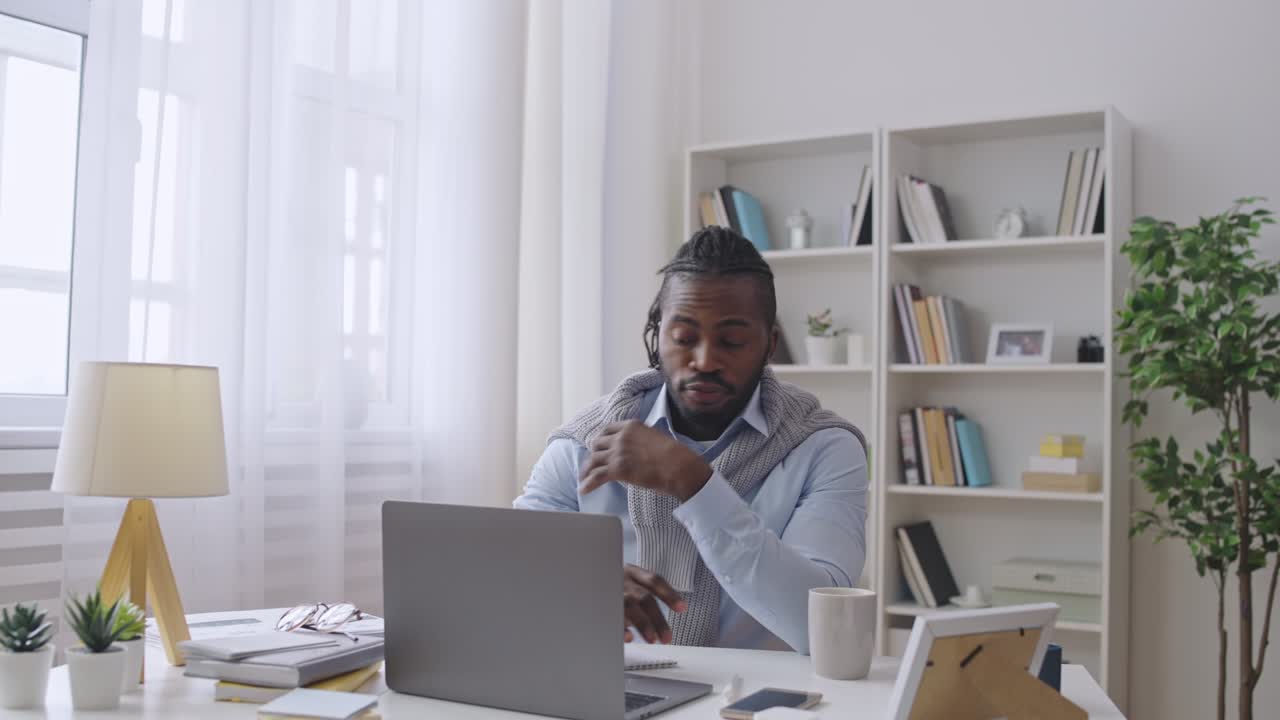 African American businessman receiving bad news, problems with project, failure