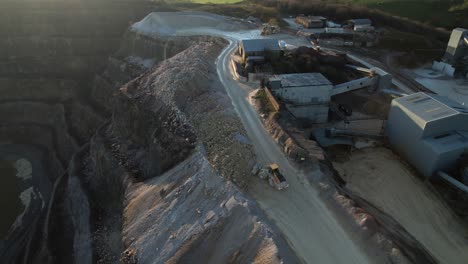 Digger-moving-gravel-in-a-quarry