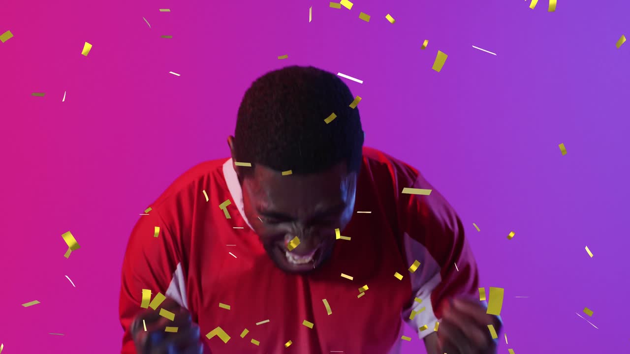 Animation of african american male soccer player over confetti