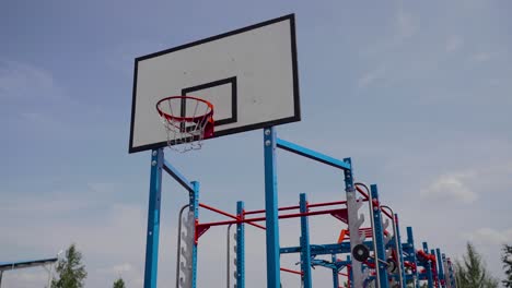 sports playground with turnstiles, treabeds and a basketball ring. horizontal bar at sports playground