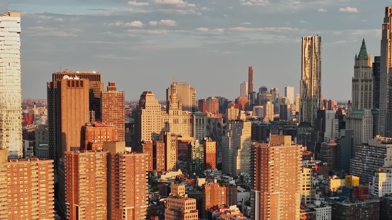Stunning aerial view of New York City skyline at sunset from a drone