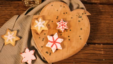 christmas gingerbread cookies on wooden table