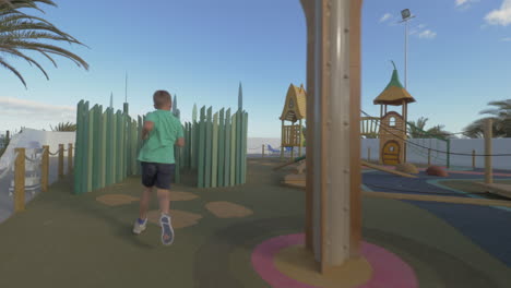 boy having fun on large playground