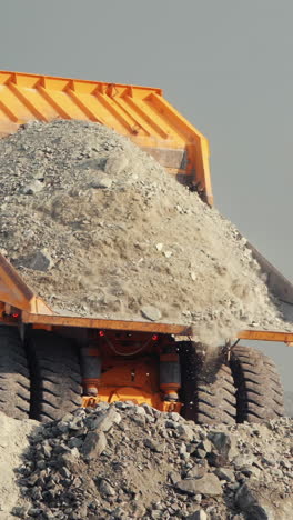 large mining truck carrying rocks