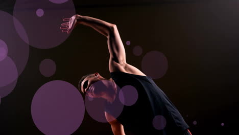 animation of caucasian basketball player throwing ball and spots of light on black background