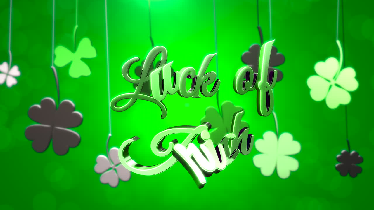 Animation closeup Luck of Irish text and motion small green shamrocks on Saint Patrick Day shiny background 2