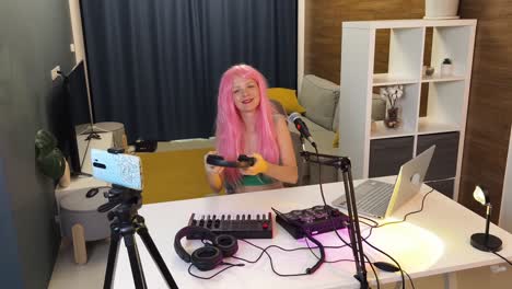 woman streaming/recording content in home studio