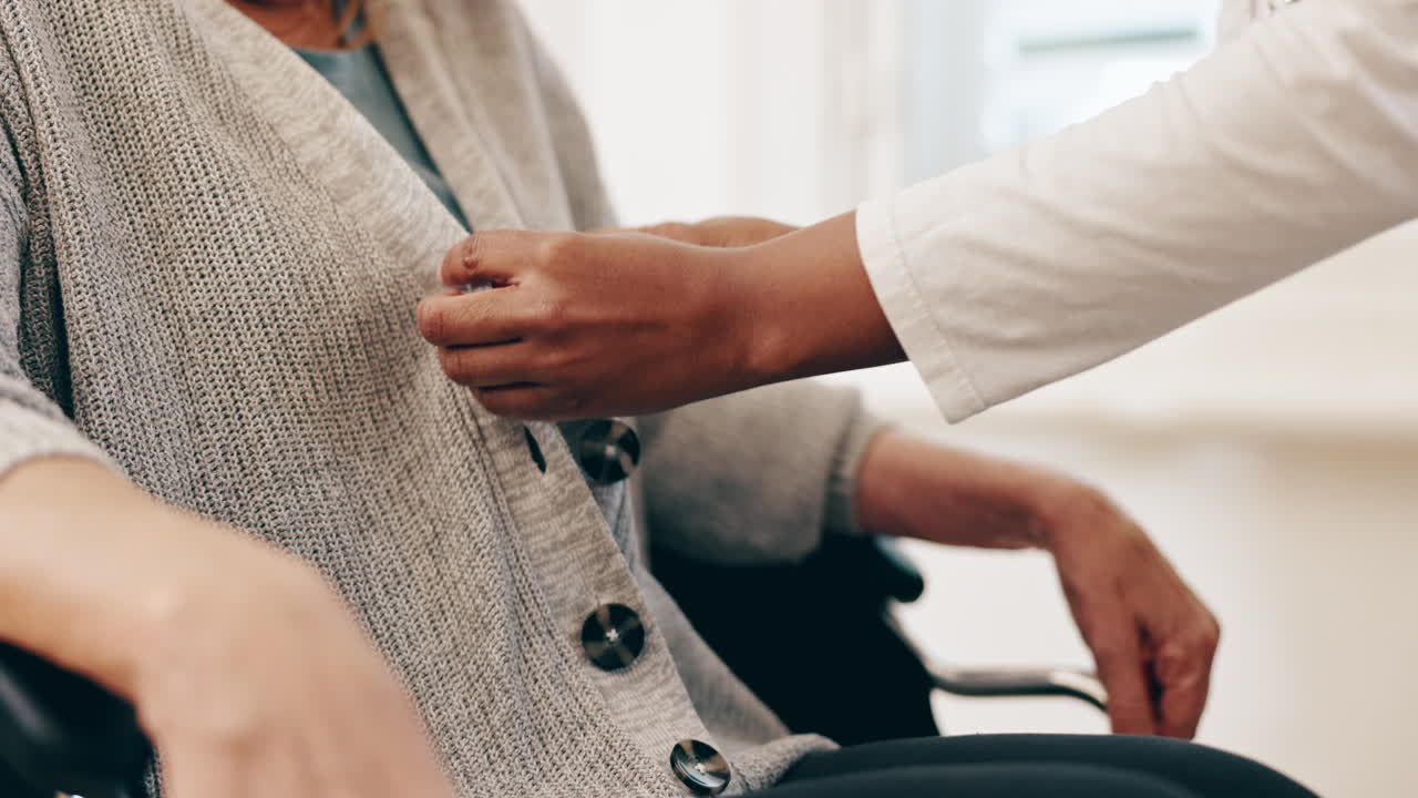 Nurse Assisting Elderly Patient with Dressing