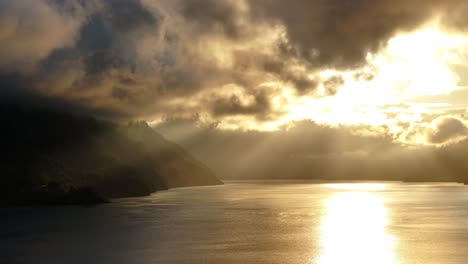 majestic sunset over lake and mountains