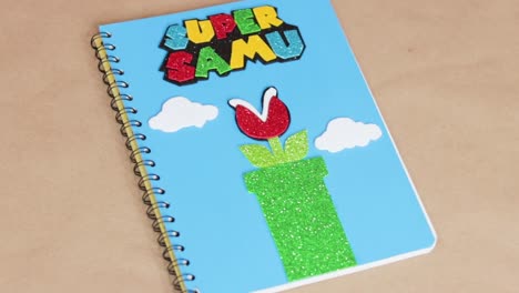 kids notebook with custom made front page, paper crafts establisher