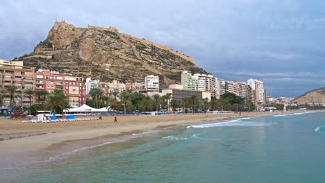 the beach of alicante city "playa del postiguet" after a heavy rain