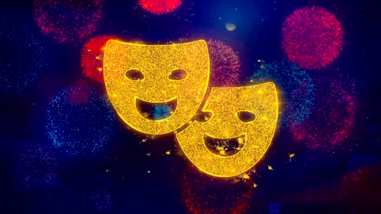 las máscaras de teatro simbolizan el icono en coloridas partículas de fuegos artificiales.