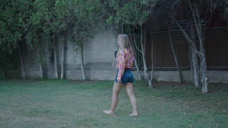 woman walking in a garden