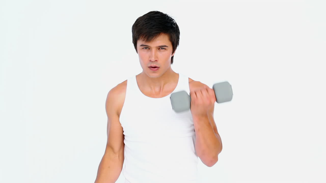 Man using dumbell